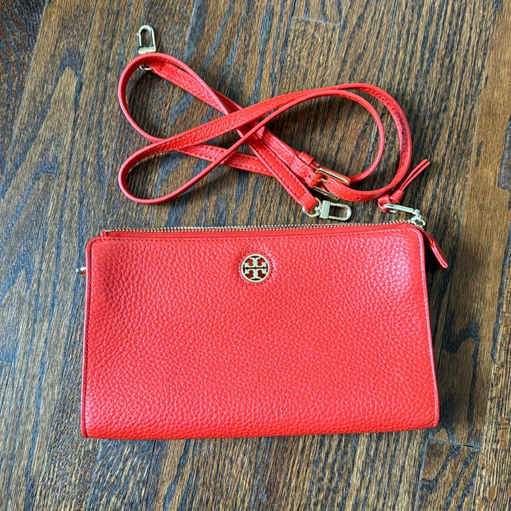 Tori Burch orange clutch/crossbody